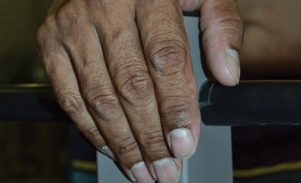 Close up of an elderly Indigenous person's hand