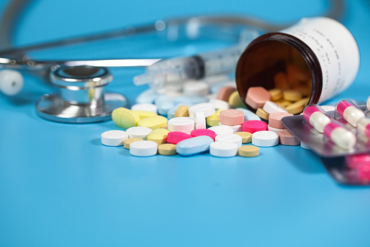 A closeup view of a spilled antimicrobial tablet bottle